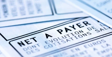 Clamart, France - April 12, 2019: French payroll with income tax deduction. Closeup shot 