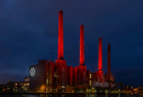 Wolfsburg, Germany - dec 18th 2020: Volkswagen Autostadt and car plant are prominent landmarks of Wolfsburg. Both are beautifully illuminated for holiday season.